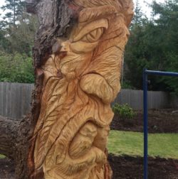 chainsaw sculpture of tree spirit in Seattle