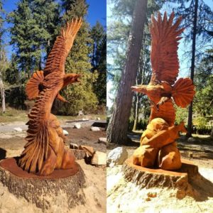 chainsaw carving of soaring eagle by Tomas Vrba
